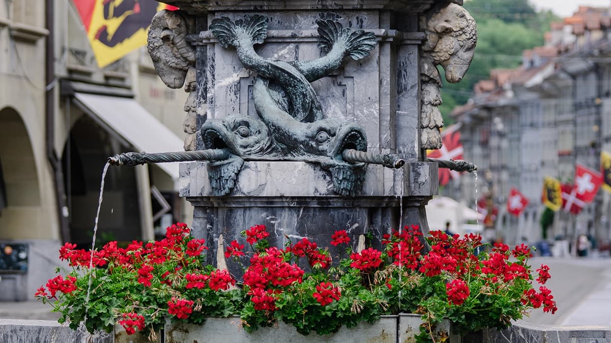 Flower-decorated fountain in Bern's old town.