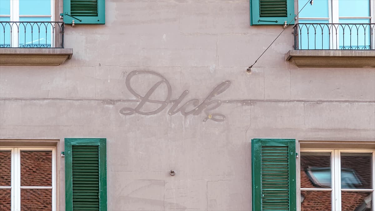 Old sign of a shop in Bern's old town.