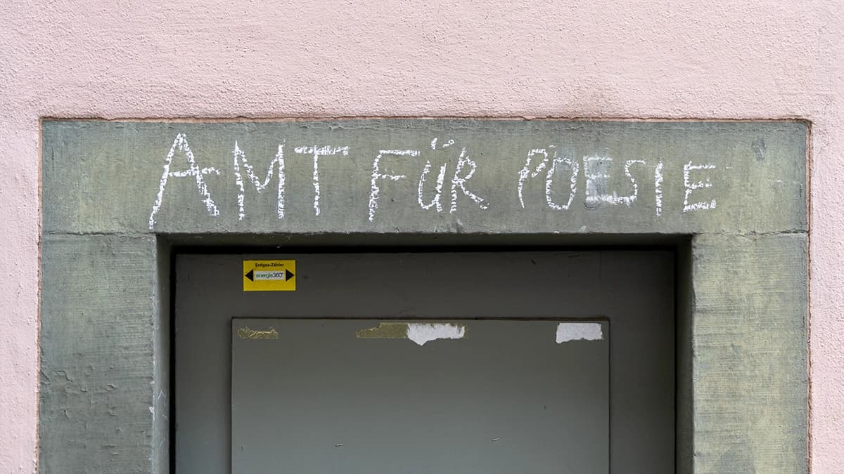 Chalk graffiti “Office for Poetry” in Zurich.