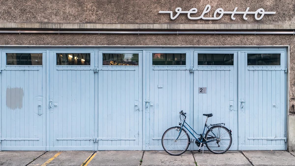 A bicycle under the Velotto sign in Zurich.