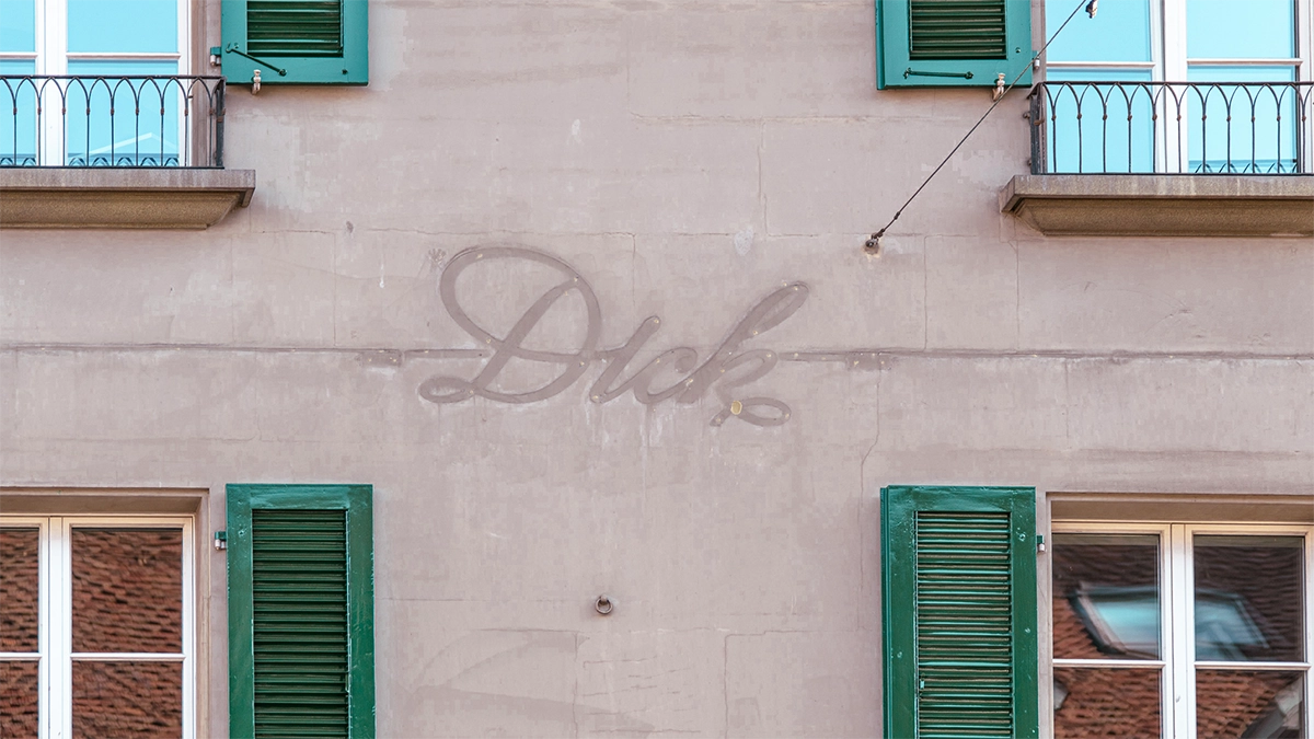 Old sign of a shop in Bern's old town.