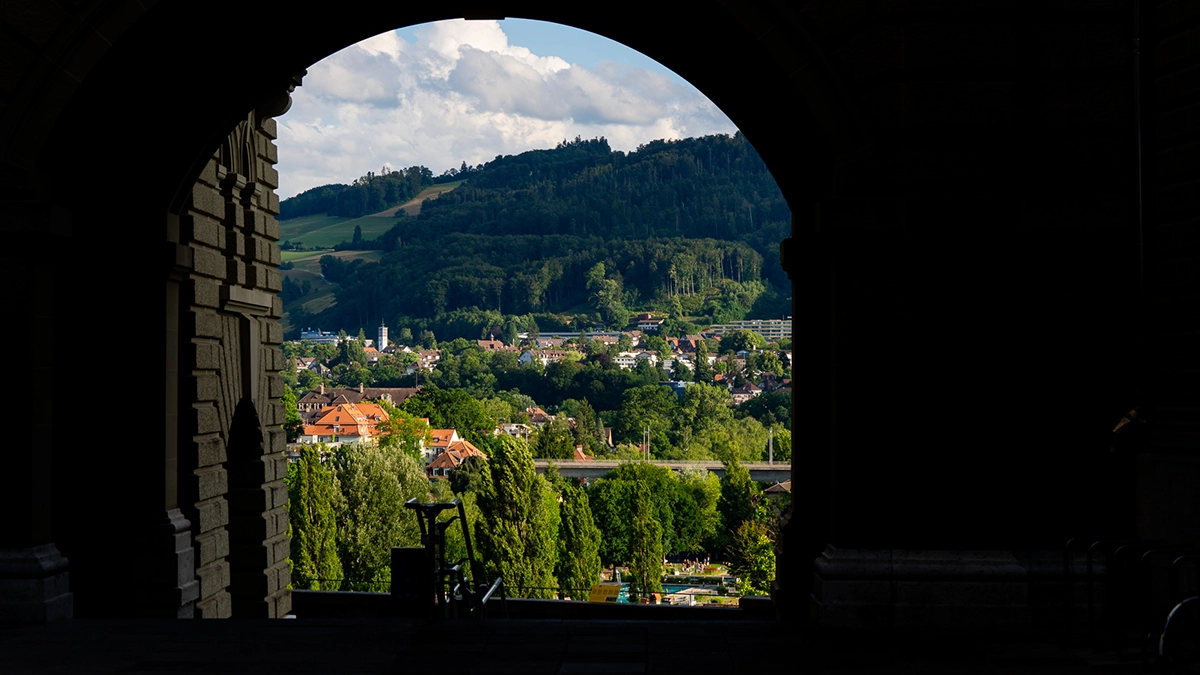 View of the Bernese countryside through the government building in Bern.